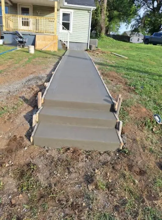 New concrete steps freshly poured in their forms in Knoxville, Tennessee